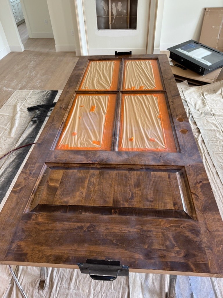 Finished stained wood entry door