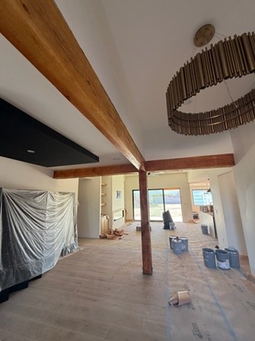 Interior with stained wood ceiling beams