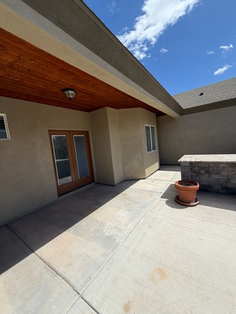 Patio with stained wood ceiling