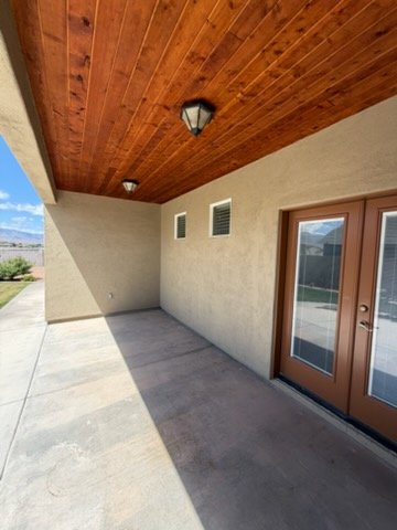 Patio with stained ceiling and french doors